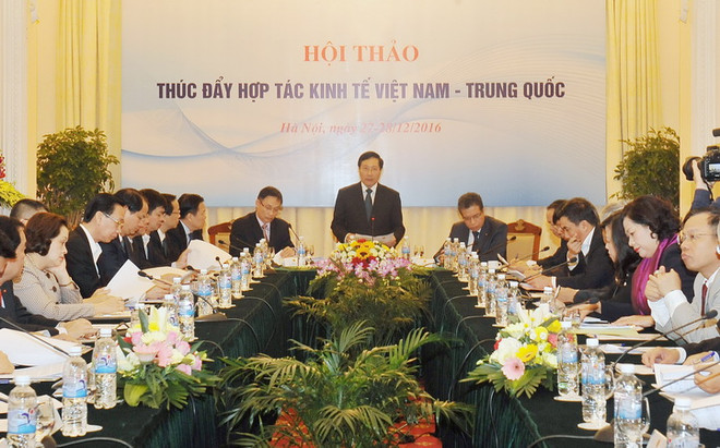 Ông Phạm Bình Minh, Ủy viên Bộ Chính trị, Phó Thủ tướng, Bộ trưởng Ngoại giao, Chủ tịch Ủy ban chỉ đạo hợp tác song phương Việt Nam-Trung Quốc đến dự và phát biểu tại Hội thảo 'Thúc đẩy hợp tác kinh tế Việt Nam-Trung Quốc.' (Ảnh: Nguyễn Khang/TTXVN) Đánh giá toàn diện về hợp tác kinh tế giữa Việt Nam và Trung Quốc ảnh 1