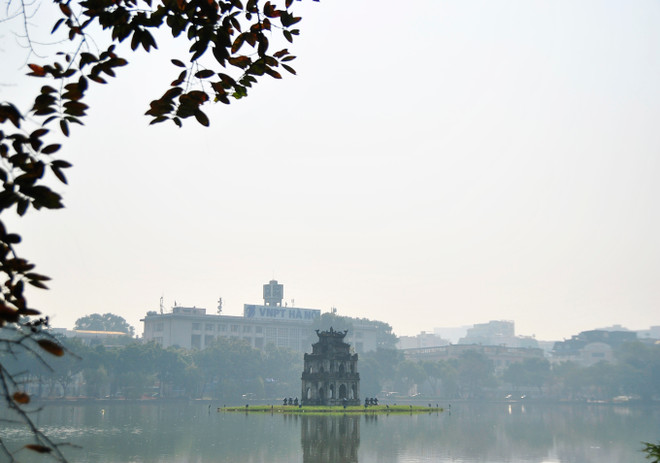 [Photo] Người dân Thủ đô tận hưởng buổi sáng Mùng 1 ngập nắng ảnh 7