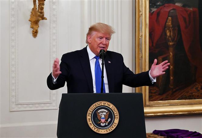 Tổng thống Mỹ Donald Trump. (Nguồn: AFP/TTXVN) Thời điểm Tổng thống Mỹ ký thỏa thuận thương mại với Mexico và Canada ảnh 1