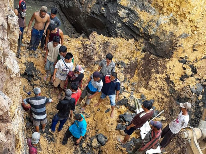 Hiện trường vụ sạt lở. (Nguồn: AFP) Lở đất tại mỏ than ở Indonesia, 11 người thiệt mạng ảnh 1