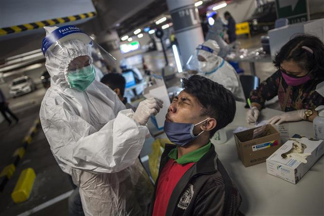 Indonesia thông báo dỡ bỏ toàn bộ hạn chế chống dịch COVID-19 ảnh 1