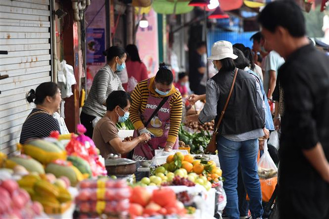 Sức ép lạm phát tại Trung Quốc đã giảm bớt trong tháng 11 ảnh 1