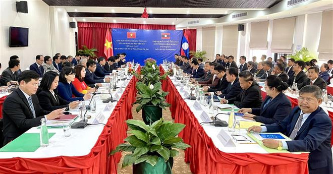 Quang cảnh cuộc họp. (Ảnh: TTXVN phát) Việt-Lào giữ vững đường biên giới chung luôn hòa bình, ổn định ảnh 1
