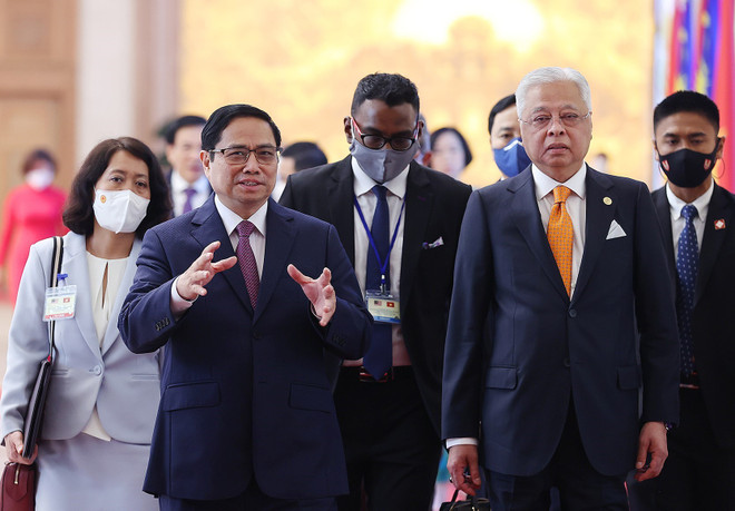 Thủ tướng Phạm Minh Chính và Thủ tướng Malaysia Dato’ Sri Ismail Sabri bin Yaakob. (Ảnh: Dương Giang/TTXVN) Xung lực mới cho quan hệ đối tác chiến lược Việt Nam-Malaysia ảnh 1