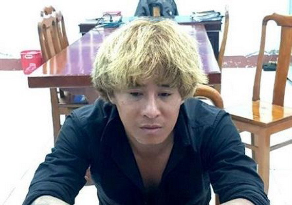 Đối tượng Lê Công Minh tại cơ quan chức năng. (Nguồn: TTXVN phát) Bình Phước: Bắt khẩn cấp đối tượng sát hại 2 mẹ con bạn gái ảnh 1