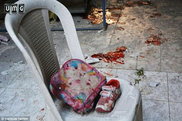 Xót xa các em bé Syria bị thương khi trường mầm non bị đánh bom ảnh 11