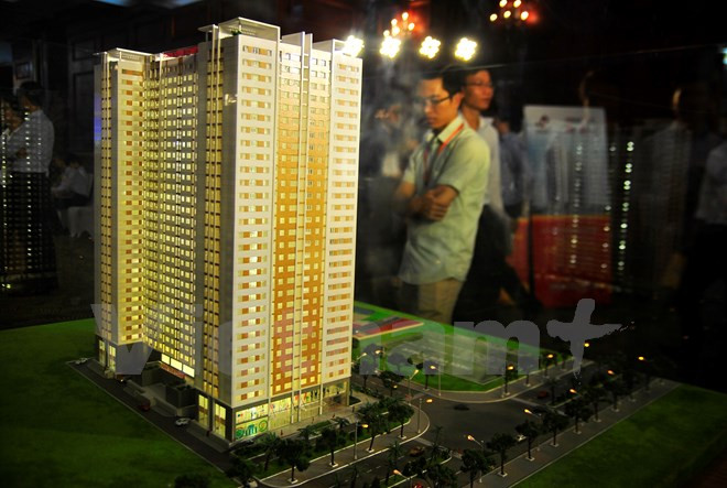 Quy định áp chỉ tiêu 3 tầng hầm cho các công trình làm tắc hoạt động đầu tư bất động sản, làm khó doanh nghiệp? (Ảnh: Võ Phương/Vietnam+) Áp chỉ tiêu 3 tầng hầm làm tắc hoạt động đầu tư bất động sản? ảnh 1