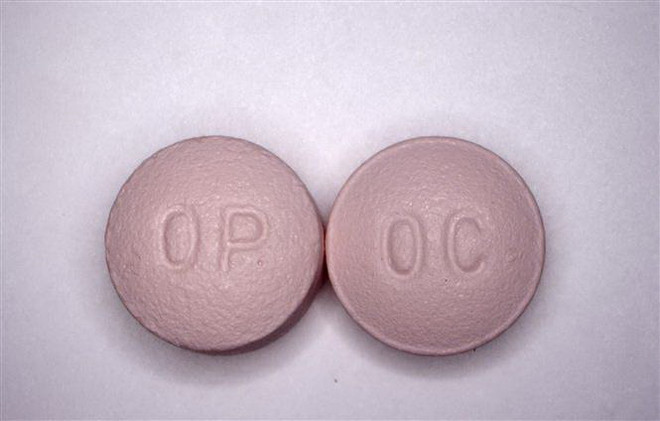 Thuốc giảm đau có chứa opioid. (Nguồn: AFP/TTXVN) Các hãng dược đạt thỏa thuận 48 tỷ USD dàn xếp bê bối thuốc giảm đau? ảnh 1