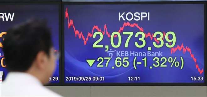 Chứng khoán châu Á đi ngược chiều nhau trong phiên 25/10 ảnh 1