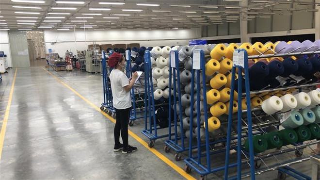 Duy trì sản xuất giữa tâm dịch: Gồng mình duy trì '3 tại chỗ' ảnh 1