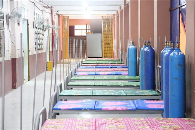 Bệnh viện Dã chiến quy mô 500 giường để thu dung, điều trị bệnh nhân COVID-19 tại huyện Dầu Tiếng sẵn sàng chia lửa cho vùng đỏ. (Ảnh: TTXVN) Dịch chưa được kiểm soát triệt để, còn khả năng bùng phát ảnh 1