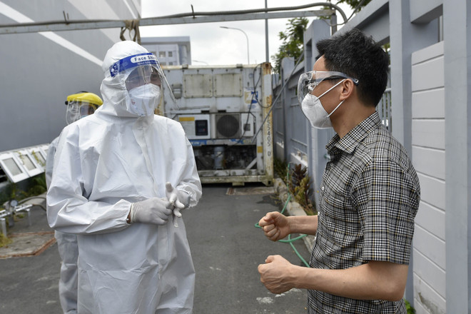 Phó Thủ tướng Vũ Đức Đam kiểm tra công tác chống dịch tại quận 7 ảnh 4