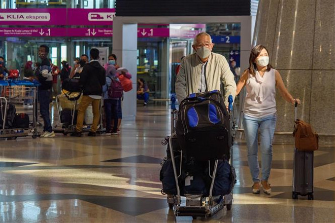 Malaysia cân nhắc áp đặt trở lại các biện pháp kiểm soát biên giới ảnh 1