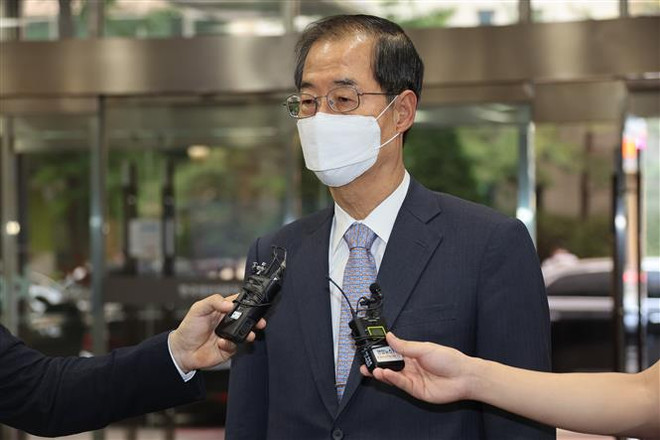 Ông Han Duck-soo phát biểu với báo giới tại Seoul, Hàn Quốc ngày 20/5/2022. (Ảnh: Yonhap/TTXVN) Tổng thống Hàn Quốc ký bổ nhiệm Thủ tướng, hoàn thiện nội các ảnh 1
