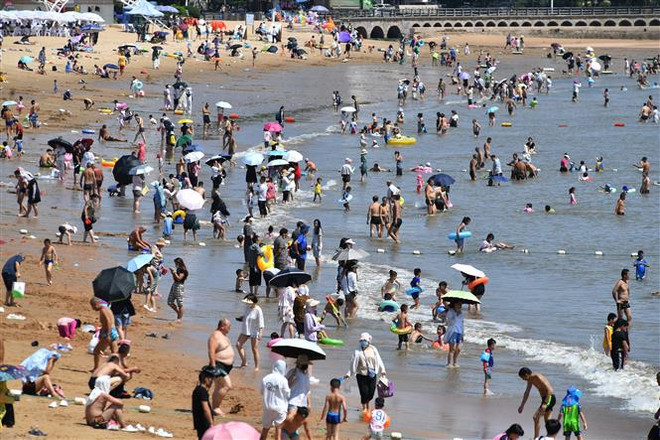 Trung Quốc ra cảnh báo cao nhất về tình trạng nắng nóng ở nhiều nơi ảnh 1