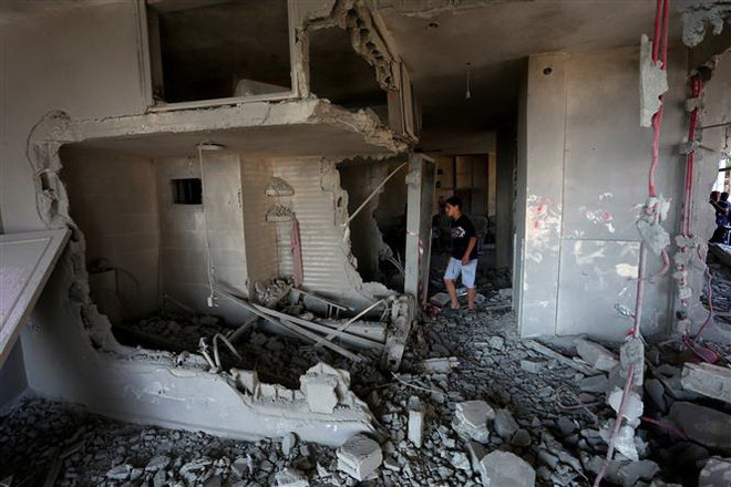 Hàng chục người thương vong trong cuộc đụng độ ở khu Bờ Tây ảnh 1