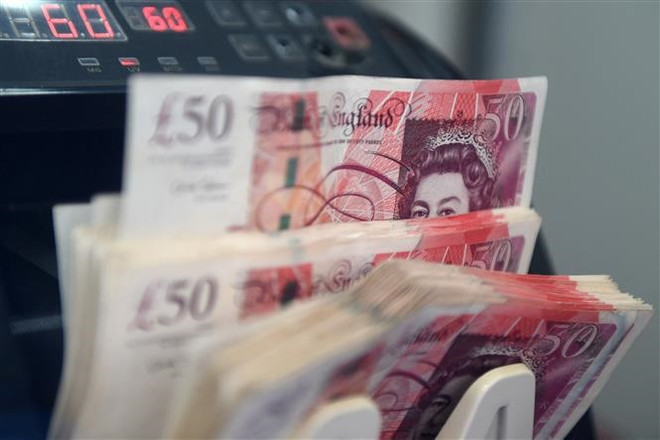 Dòng tiền rời khỏi đồng USD, đồng bảng Anh trên đà tăng mạnh nhất ảnh 1