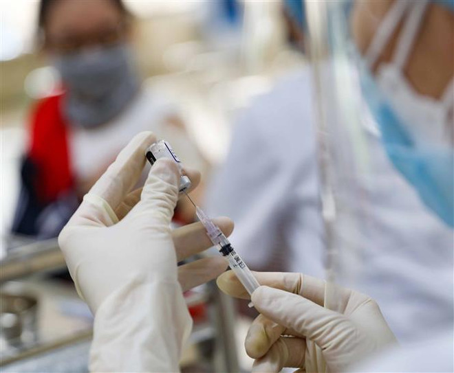 (Ảnh minh họa: Thanh Tùng/TTXVN) Thủ tướng yêu cầu điều tra sự cố sau tiêm vaccine tại Thanh Hóa ảnh 1