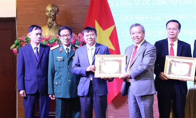 Làm sâu sắc hơn nữa quan hệ hữu nghị và hợp tác Việt Nam-Lào ảnh 2