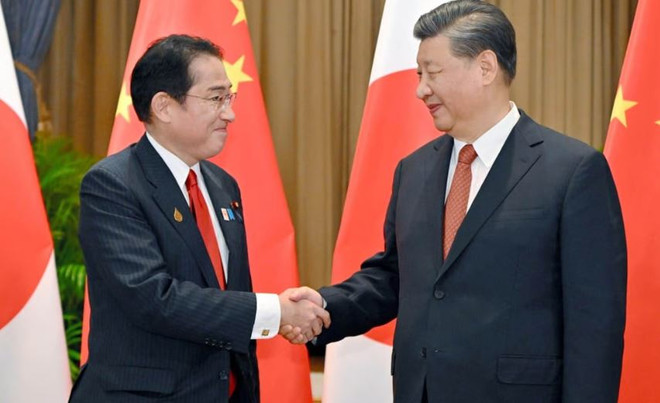 Cuộc gặp đầu tiên giữa lãnh đạo Nhật-Trung trong gần 3 năm qua ảnh 1