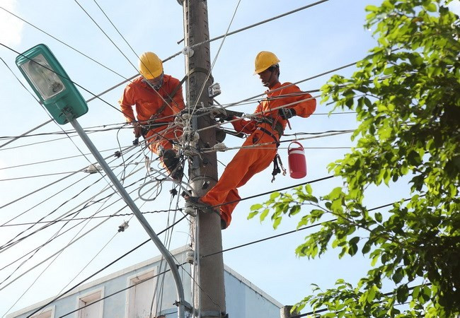 (Ảnh minh họa: Ngọc Hà/TTXVN) EVN ban hành mẫu hóa đơn điện tử và thông báo tiền điện mới ảnh 1