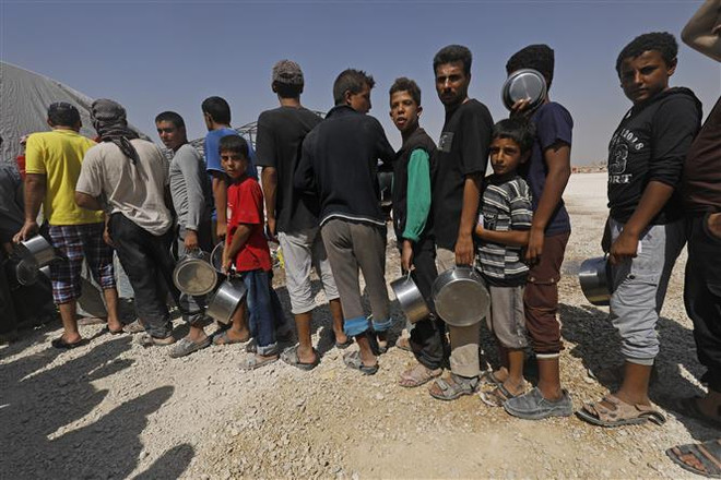 SOHR: Hơn 60 người thiệt mạng do đụng độ ở Syria trong 24 giờ ảnh 1