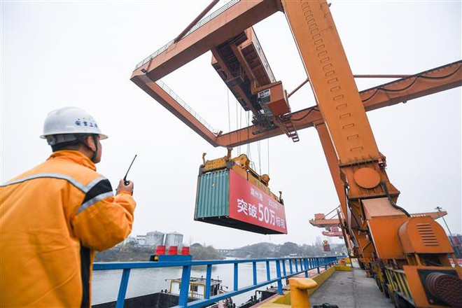 Kinh tế thế giới sẽ có một số cải thiện nhờ giảm căng thẳng thương mại ảnh 1