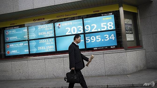 Chứng khoán trên thị trường châu Á ảm đạm phiên cuối tuần ảnh 1