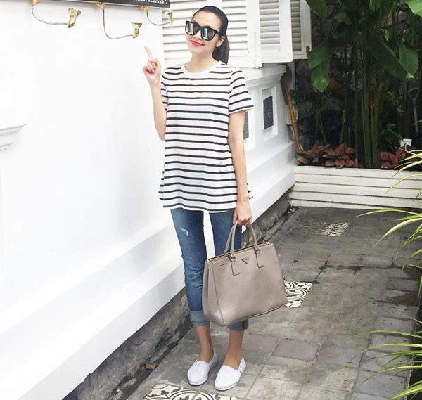 Mỹ nhân Việt lăng xê chân váy midi, sơ mi họa tiết và áo khoác cá tính ảnh 12