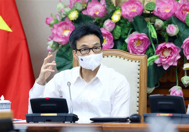 Phó Thủ tướng Vũ Đức Đam phát biểu. (Ảnh: Phạm Kiên/TTXVN) Các tỉnh, thành phía Nam phải tiêm vaccine trong thời gian nhanh nhất ảnh 2