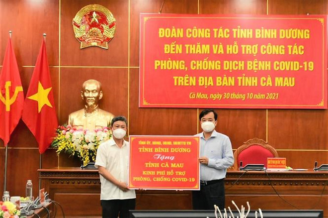 Bình Dương chia sẻ kinh nghiệm, hỗ trợ Cà Mau chống dịch COVID-19 ảnh 2