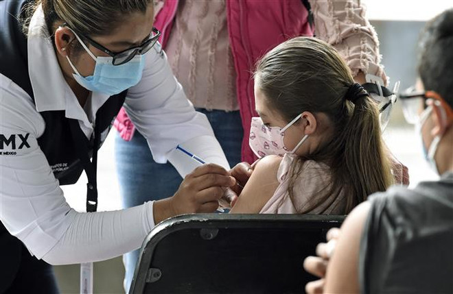 Tiêm vaccine cho trẻ - bước tiến trong nỗ lực đạt miễn dịch cộng đồng ảnh 1