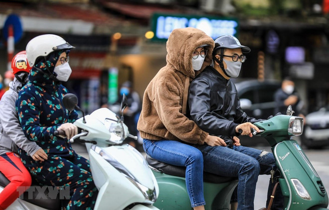 Các tỉnh khu vực Bắc Bộ đón gió mùa Đông Bắc vào chiều tối 13/2 ảnh 1