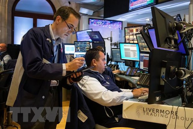 Thị trường Mỹ biến động trái chiều khi Fed thông báo tăng lãi suất ảnh 1