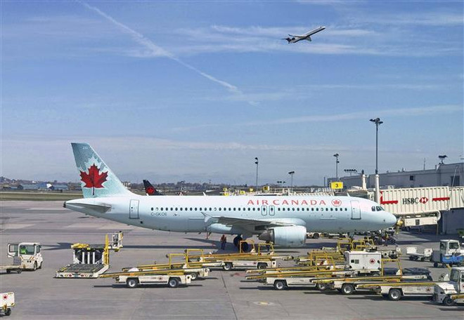 Air Canada thông báo thua lỗ hơn 700 triệu USD trong quý 1 ảnh 1
