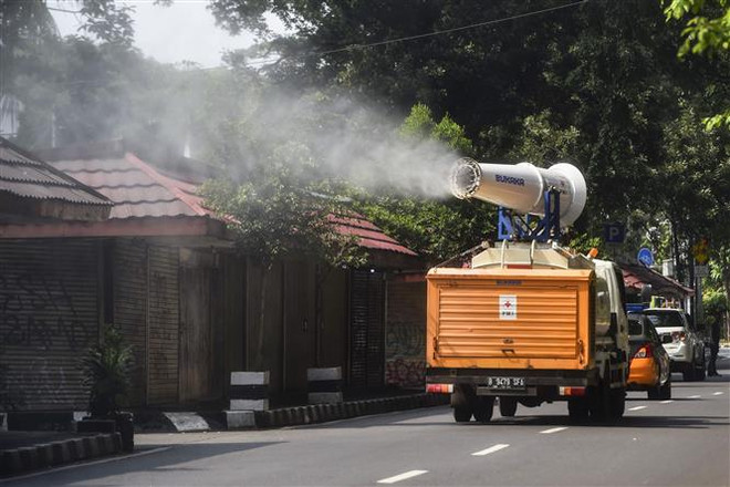 Thái Lan trữ thuốc phòng dịch tái bùng phát, Jakarta gia hạn giãn cách ảnh 2