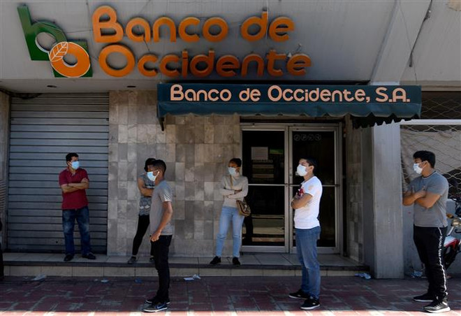 Dịch COVID-19 ở châu Mỹ: Brazil lo ngại nguy cơ kinh tế 'sụp đổ' ảnh 2