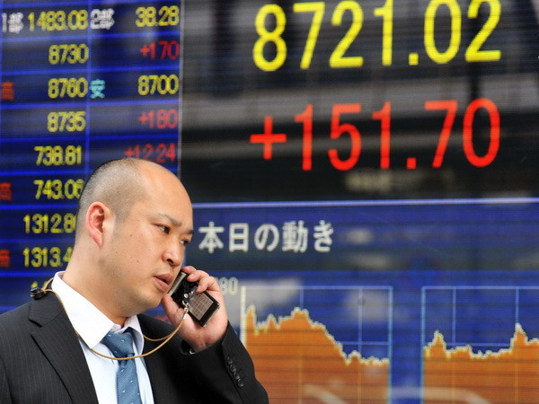 Chứng khoán châu Á tăng nhẹ trong phiên cuối tuần ảnh 1