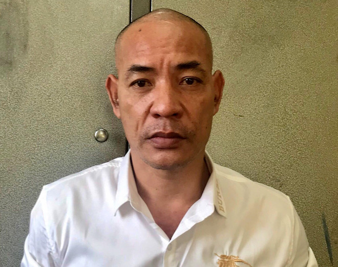 Đối tượng Nguyễn Văn Dũng (tức Dũng trọc). (Ảnh: Thanh Hải/TTXVN) Đối tượng 'Dũng trọc' bị tạm giữ hình sự tại thành phố Hòa Bình ảnh 1