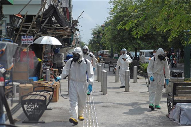 COVID-19: Indonesia ghi nhận số ca nhiễm mới theo ngày ở mức cao nhất ảnh 1