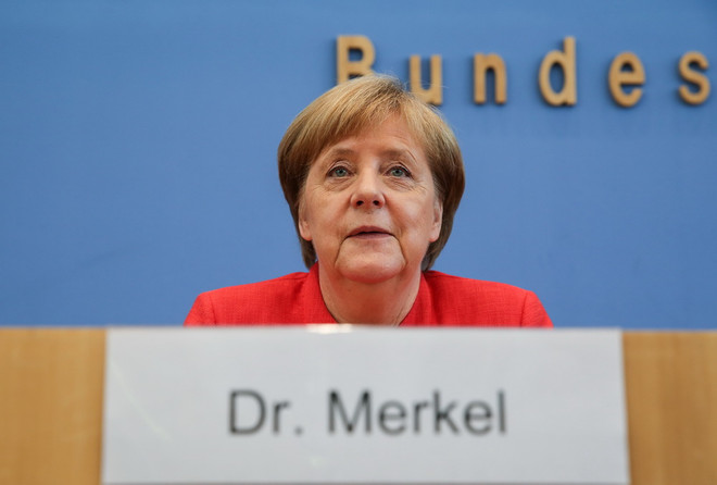 Tỷ lệ ủng hộ liên đảng của Thủ tướng Merkel giảm xuống mức thấp nhất ảnh 1