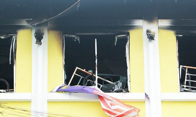 Malaysia buộc tội 2 nghi can trong vụ hỏa hoạn làm 23 người thiệt mạng ảnh 1