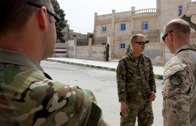 Tổng thống Mỹ Donald Trump đồng ý duy trì quân đội tại Syria lâu hơn ảnh 1