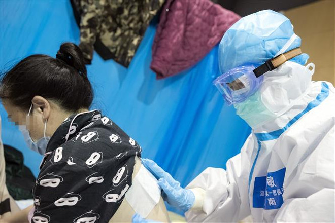 Trung Quốc đại lục ghi nhận thêm 573 ca nhiễm mới COVID-19 ảnh 1