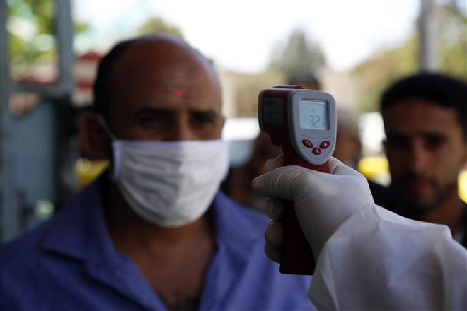 LHQ đánh giá cao các nhóm vũ trang ngừng bắn để ngăn chặn COVID-19 ảnh 1