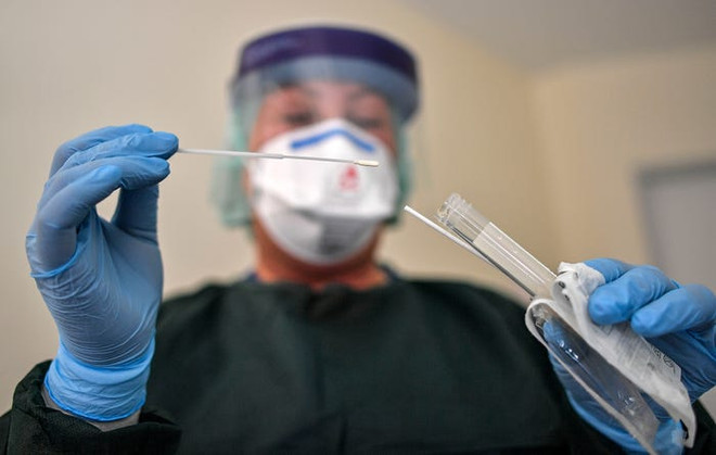 COVID-19 phơi bày những điểm yếu trong hệ thống y tế của Mỹ ảnh 2