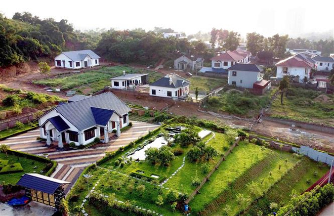 Khu hành chính 16, phường Liên Bảo, thành phố Vĩnh Yên, Vĩnh Phúc có hàng trăm ngôi nhà xây kiên cố, người dân đã sinh sống ổn định tại đây từ hơn chục năm nay. (Ảnh: Hoàng Hùng/TTXVN) Vĩnh Phúc: Giải quyết vướng mắc trong thu hồi đất tại Vĩnh Yên ảnh 2