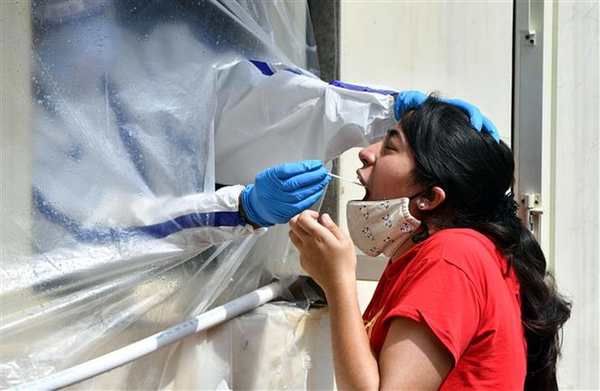 Dịch COVID-19 đến 21h ngày 21/7: Thế giới có hơn 14,9 triệu ca nhiễm ảnh 2