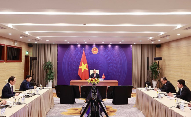 Chủ tịch nước Nguyễn Xuân Phúc phát biểu tại điểm cầu Hà Nội. (Ảnh: Thống Nhất/TTXVN) Các nước đưa ra hàng loạt cam kết mạnh mẽ để bảo vệ hành tinh xanh ảnh 2