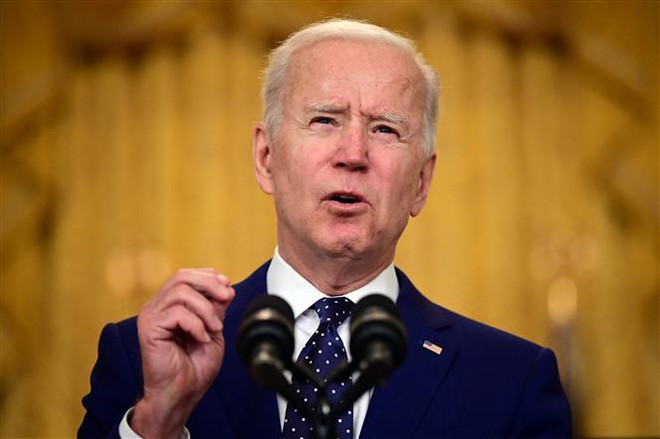 Tổng thống Mỹ Joe Biden phát biểu tại Washington, DC, ngày 15/4/2021. (Nguồn: AFP/TTXVN) Mỹ hoan nghênh Iran đàm phán liên quan thỏa thuận hạt nhân ảnh 1